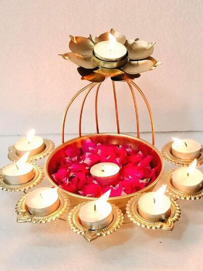 Golden decorative metal Diya Urli bowl with intricate design