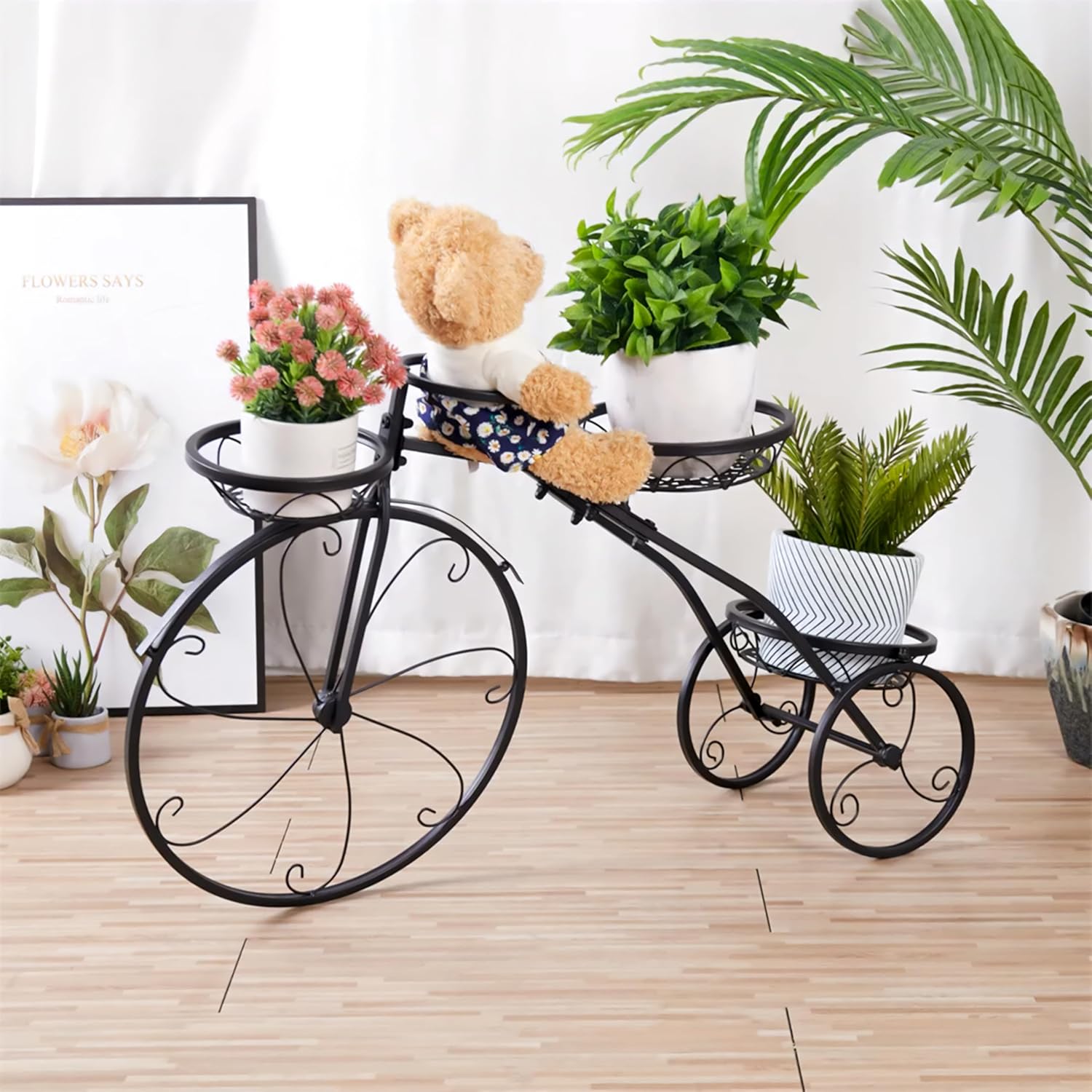 Black metal tricycle planter stand for living room decor