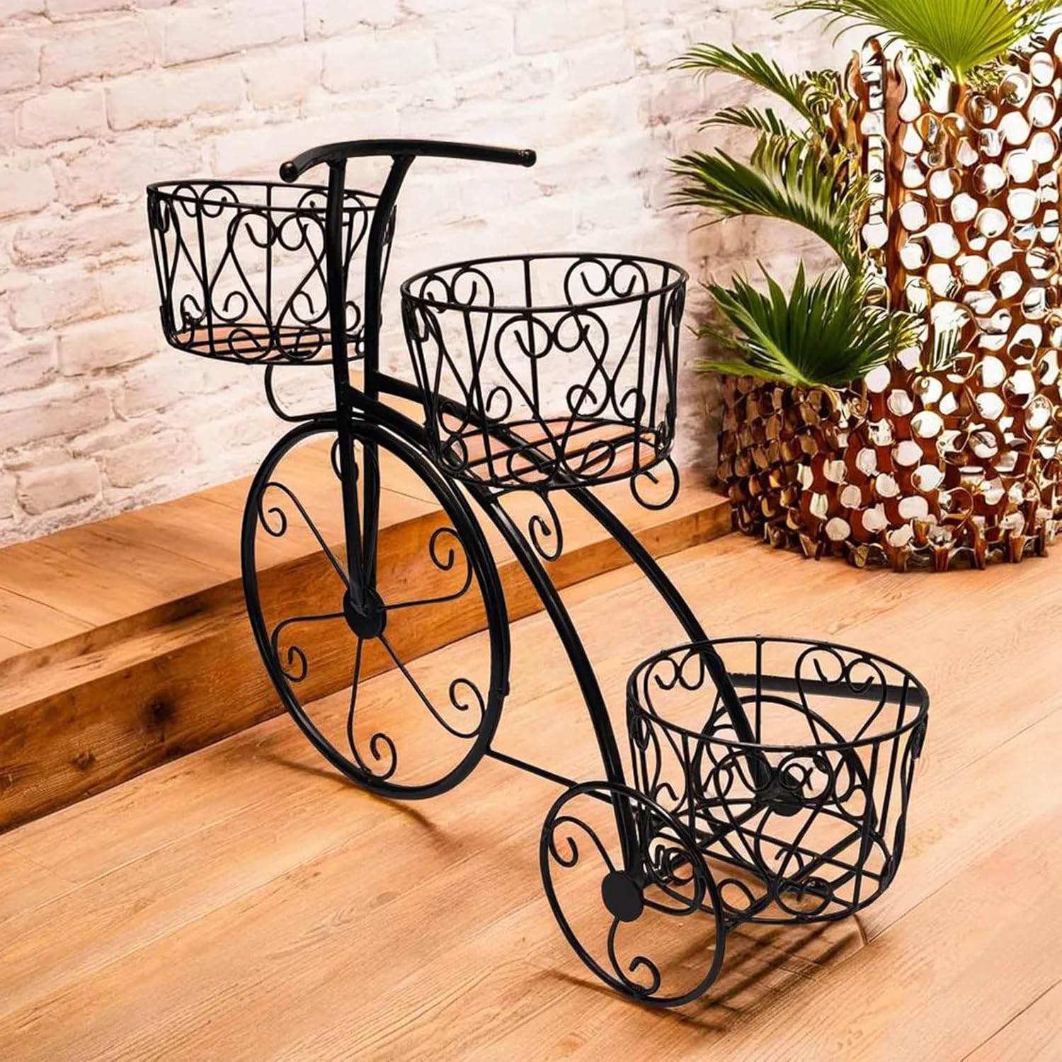 Black metal tricycle planter stand for patio decor